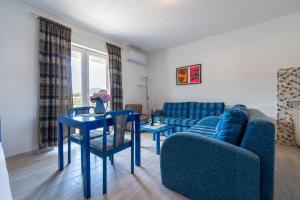 Posezení v ubytování MAS Apartments + 37 fotografií