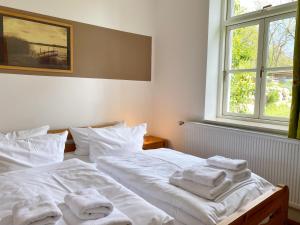 Postel nebo postele na pokoji v ubytování Ferienwohnung am Nationalpark