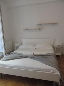Apartments Tonka客房内的一张或多张床位