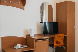 TV a/nebo společenská místnost v ubytování Villa Bachmann - Kuršių kiemas