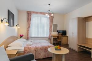 Postel nebo postele na pokoji v ubytování Villa Bachmann - Kuršių kiemas