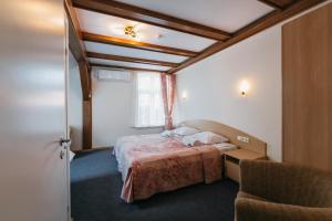 Postel nebo postele na pokoji v ubytování Villa Bachmann - Kuršių kiemas