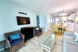 Μια τηλεόραση ή/και κέντρο ψυχαγωγίας στο Harbor House B6 Condo