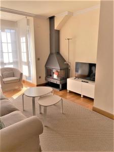 Posedenie v ubytovaní Apartamentos Del Pisuerga