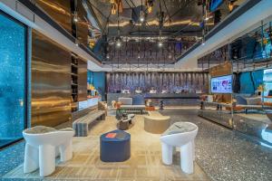Zona d'estar a Arthur Hotel Zhujiang New Town Guangzhou-Pazhou Exhibition Center Branch
