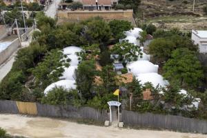 an aerial view of a yard with trees and white domes at 3 Sirene Sciacca Fronte Mare in Sciacca