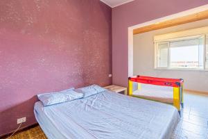 Postel nebo postele na pokoji v ubytování Casavacanza con piscina e veranda