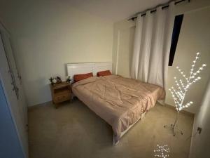 Säng eller sängar i ett rum på One Private Room Sharing Apartment Flat 31 Room 3