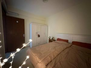 Un pat sau paturi într-o cameră la One Private Room Sharing Apartment Flat 31 Room 3