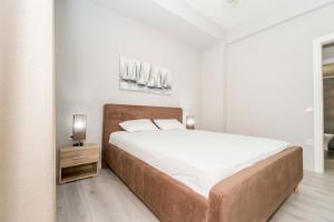 Una cama o camas en una habitación de minimal spacious apartment in Kallithea