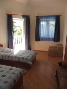 Posteľ alebo postele v izbe v ubytovaní Gardenia Apartments