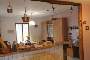 a kitchen with a counter with some boxes on it at Locazione turistica aquila bianca in Roccabruna