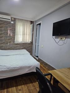 TV a/nebo společenská místnost v ubytování Guest house 2 floor