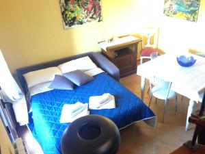 Ένα ή περισσότερα κρεβάτια σε δωμάτιο στο Alba Rosa Niususu