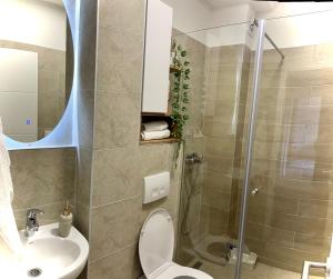 Koupelna v ubytování Luxury Apartment Suljic + 11 fotografií