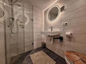 Koupelna v ubytování Haus Silbertann + 10 fotografií