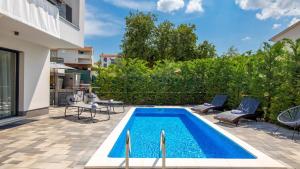 Πισίνα στο ή κοντά στο Luxury Villa MetraMaris2