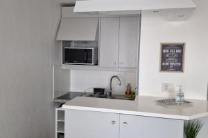 Η κουζίνα ή μικρή κουζίνα στο Appartement La Baule Le Cocon des Lilas