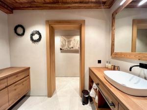 Ένα μπάνιο στο CHALET KITZBICHL by Alpin Charme Apartments