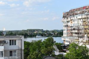 a view of a river from a building at Casa Mara in Tulcea