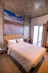 Llit o llits en una habitació de CAMPOS DE HOLAMBRA INN