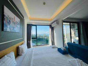 Postel nebo postele na pokoji v ubytování Aristo 2 Phuket, Surin beach + 37 fotografií