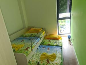 Voodi või voodid majutusasutuse Apartman A&M toas