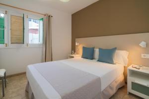 Katil atau katil-katil dalam bilik di Sabbia Suites Alaia Famara