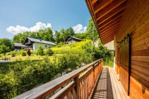 a porch of a home with a view of a yard at Sumptuous 4-star chalet for unforgettable stays in Saint-Gervais-les-Bains