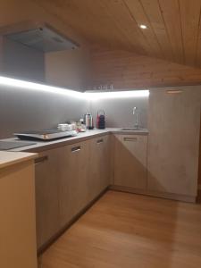 a kitchen with a sink and a counter top at Al-Colle in Sotto il Monte