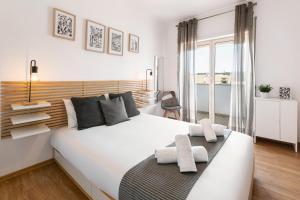 Postel nebo postele na pokoji v ubytování Óbidos Pool & Charm + 26 fotografií