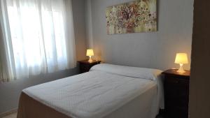 Postel nebo postele na pokoji v ubytování Casa Rubio