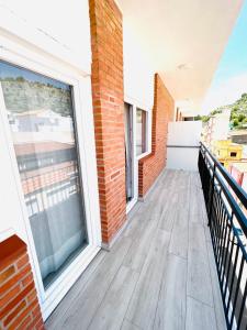Un balcón o terraza de Apartamentos Hotel Puente de Hierro