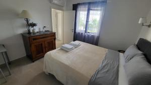 Posteľ alebo postele v izbe v ubytovaní Apartments Amadea