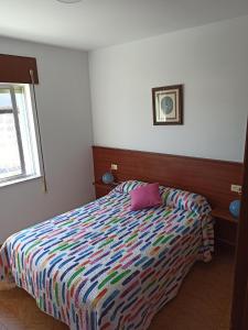 Posteľ alebo postele v izbe v ubytovaní Casa en Puerto de Bares