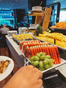 a buffet with lots of food on a table at Le Meridien Panama in Panama City
