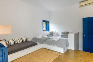 Postel nebo postele na pokoji v ubytování Hidesign Athens Villa In Sounio