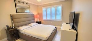 Letto o letti in una camera di Dolphin Cove in Cocoa Beach Fl