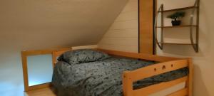 a small bedroom with a bed in a attic at Peter in Michelstadt