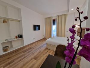 TV a/nebo společenská místnost v ubytování Cuma Suites
