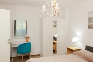 Posteľ alebo postele v izbe v ubytovaní Breeze apartment
