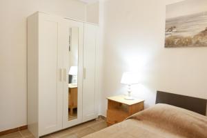 Posteľ alebo postele v izbe v ubytovaní Breeze apartment