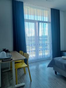 Postel nebo postele na pokoji v ubytování Figaro Apartaments