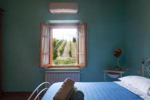 Posteľ alebo postele v izbe v ubytovaní Casale il Fontanellino - country house near Florence