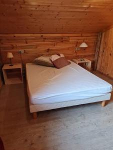 En eller flere senge i et værelse på Chalet familial - Pyrénées, au cœur des 3 stations