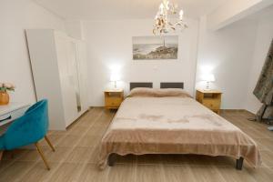 Posteľ alebo postele v izbe v ubytovaní Breeze apartment