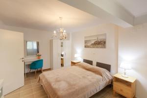 Posteľ alebo postele v izbe v ubytovaní Breeze apartment