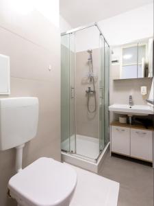 A bathroom at Amoroso apartment 200m from sea