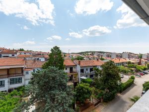 a view of a city from a building at Amoroso apartment 200m from sea in Poreč