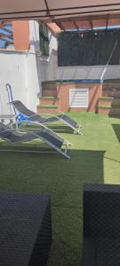 a rendering of a backyard with a altán w obiekcie luxury homes penthouse con jacuzzi vera, garrucha,mojacar w mieście Vera